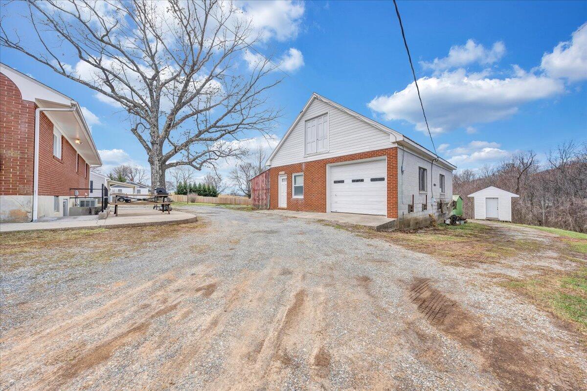 1090 Garner Road Vinton, VA 24179 - Photo 14 of 23 a view of large house with a street
