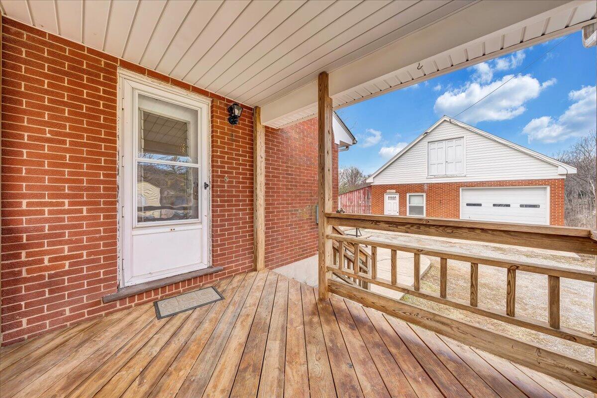 1090 Garner Road Vinton, VA 24179 - Photo 16 of 23 a view of a balcony with wooden floor