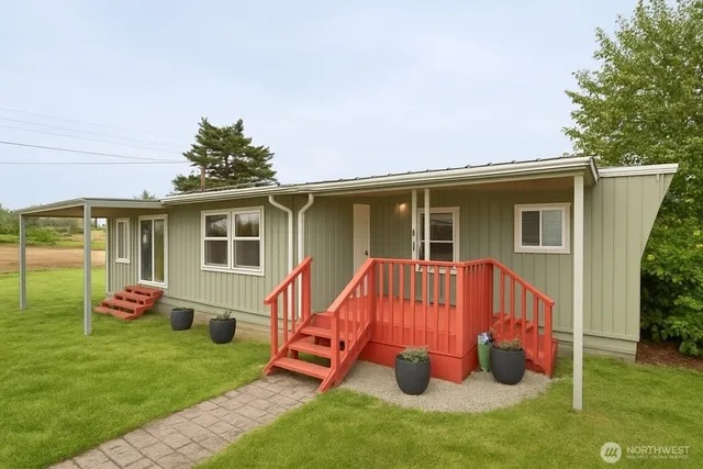 a backyard of a house with seating space