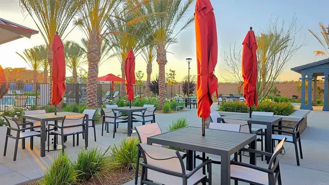 a outdoor space with lots of tables and chairs