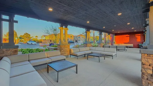 a balcony with furniture and outdoor view