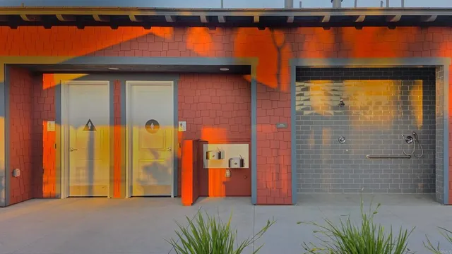 a view of a porch with a door and a yard