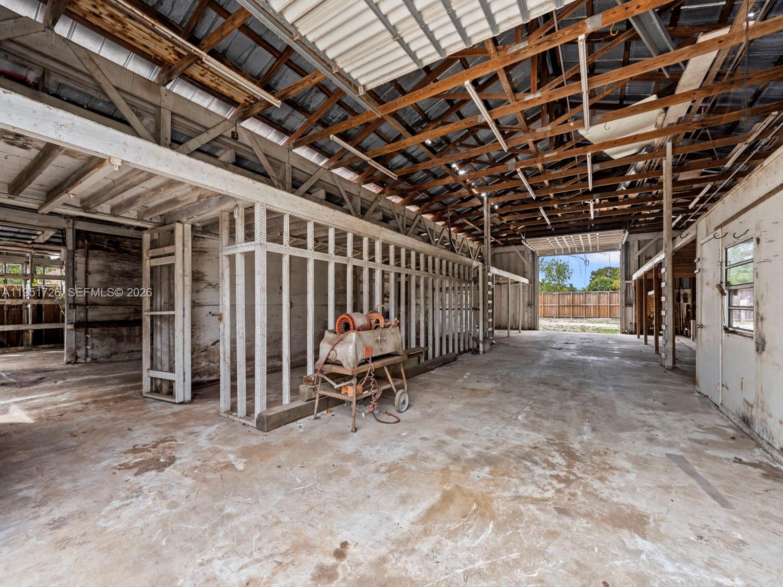 12570 Southwest 45th Street Miami, FL 33175 - Photo 20 of 25 a view of an empty room with wooden roof