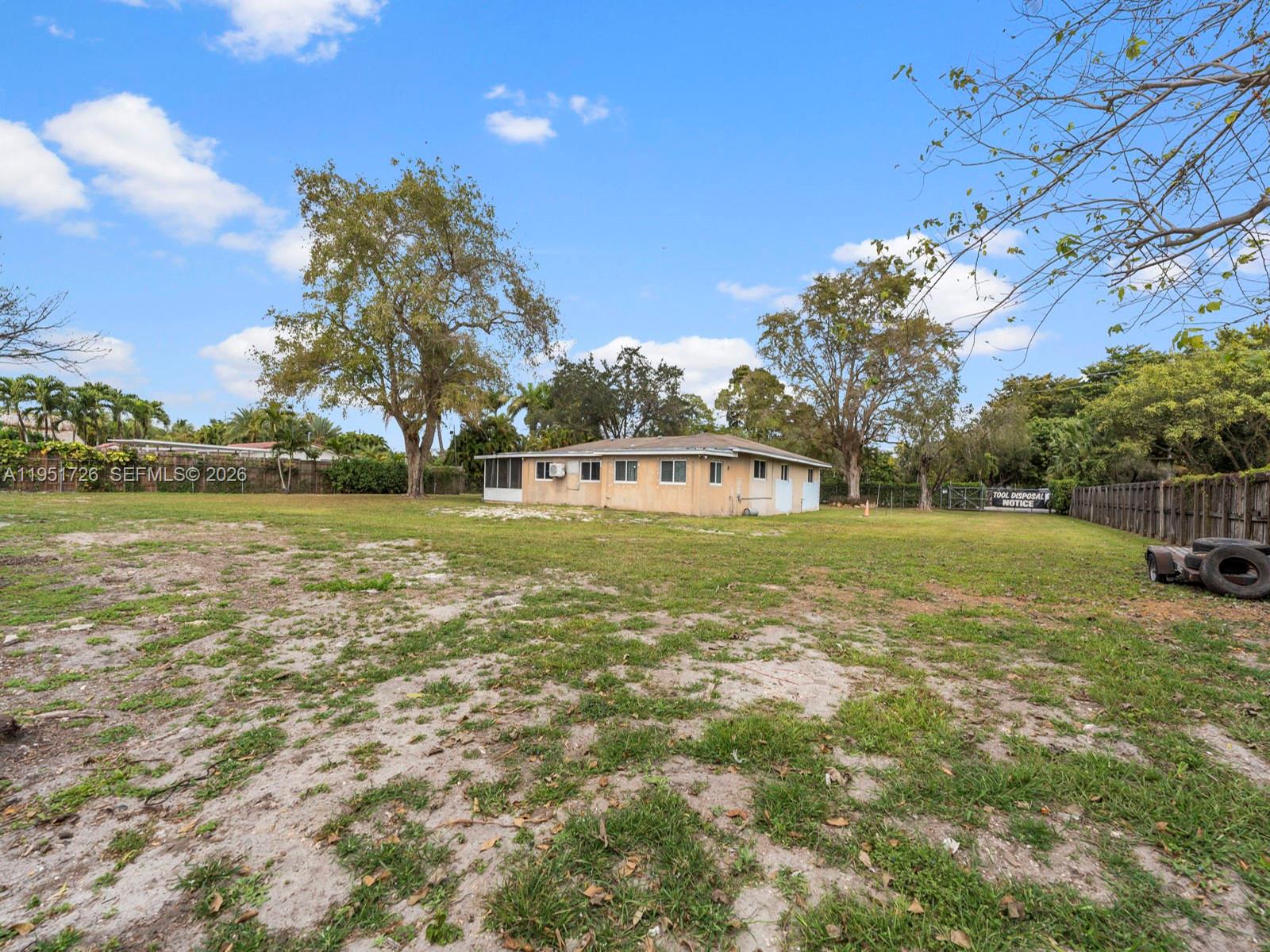 12570 Southwest 45th Street Miami, FL 33175 - Photo 21 of 25 a view of a garden with a house