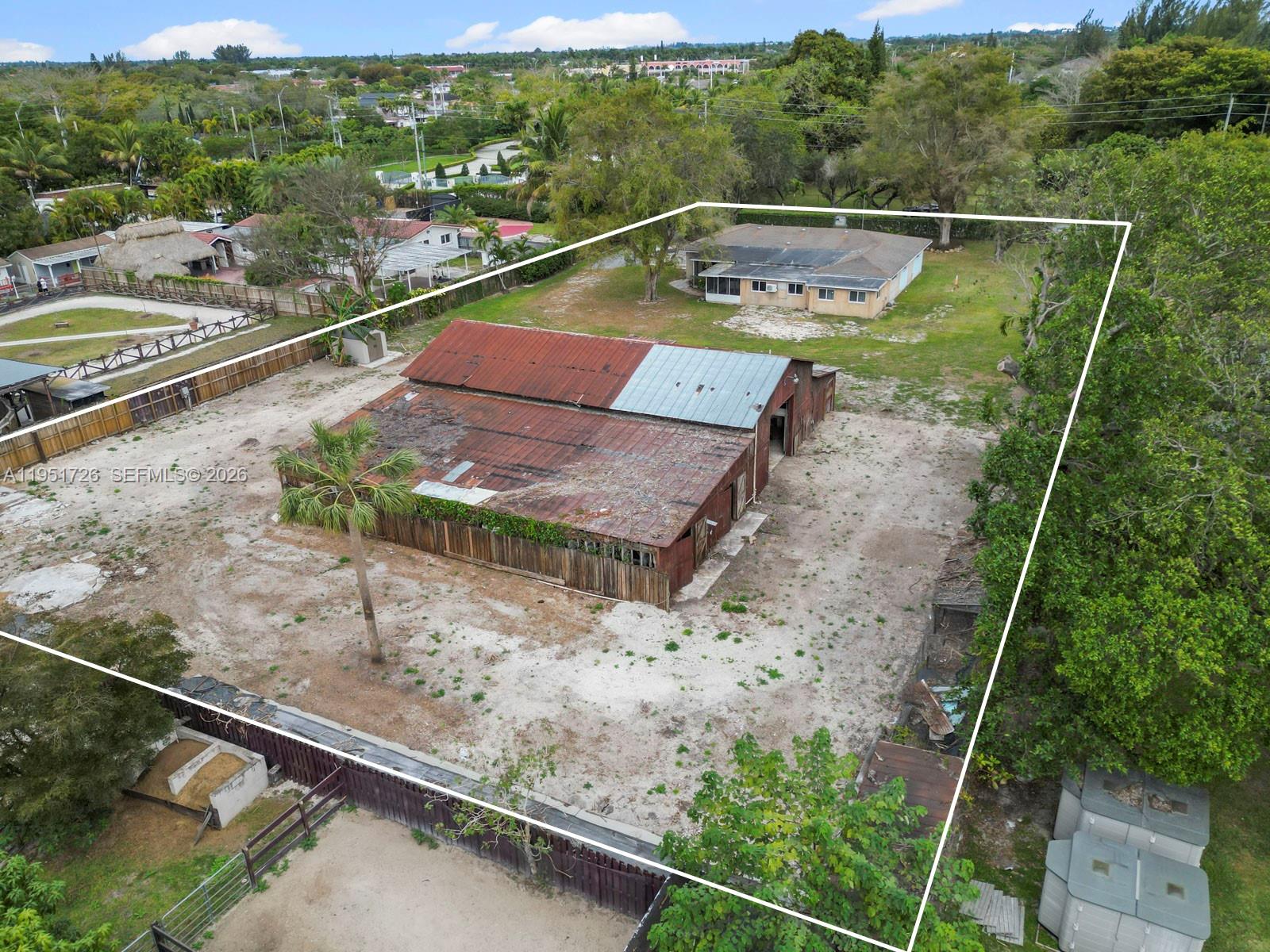 12570 Southwest 45th Street Miami, FL 33175 - Photo 5 of 25 a view of a swimming pool with a yard