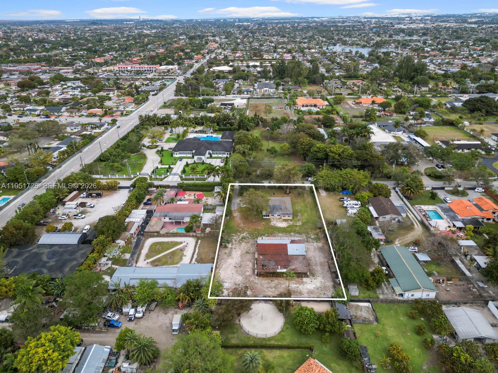 12570 Southwest 45th Street Miami, FL 33175 - Photo 6 of 25 an aerial view of residential houses with outdoor space and swimming pool