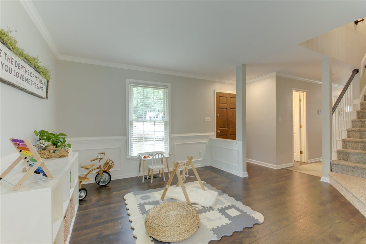 5516 Banwell Place Raleigh, NC 27613 - Photo 3 of 30 Inviting entry welcomes you to home filled with light! New Engineered Hand Scraped Hardwoods Throughout First Floor. Newer interior paint (2018) Bright and Airy!