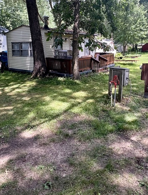 26-235 Woodhaven Sublette, IL 61367 - Photo 2 of 11 a view of a chairs in a backyard