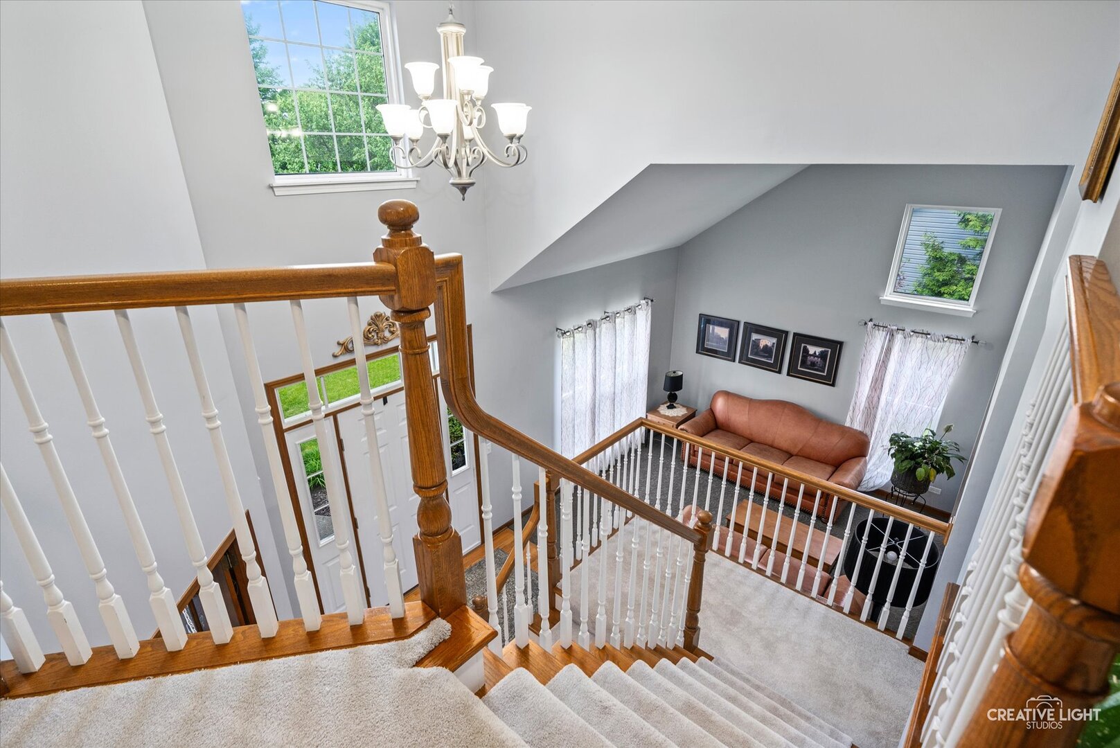 2828 Miller Road Geneva, IL 60134 - Photo 23 of 40 a view of stairs and hall with wooden floor
