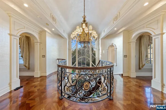 a view of a chandelier and entryway