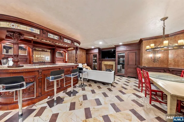 a view of a chairs and table in a room