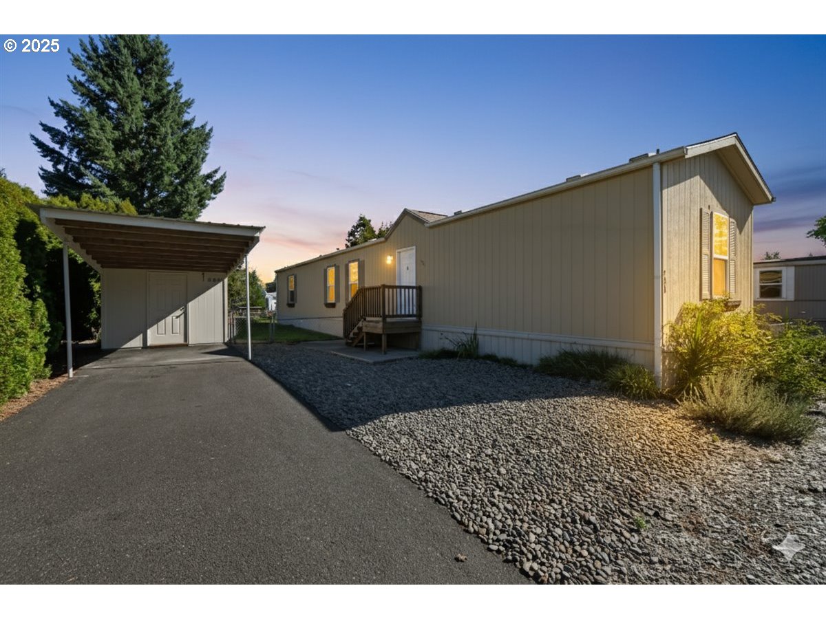 a house view with a backyard space