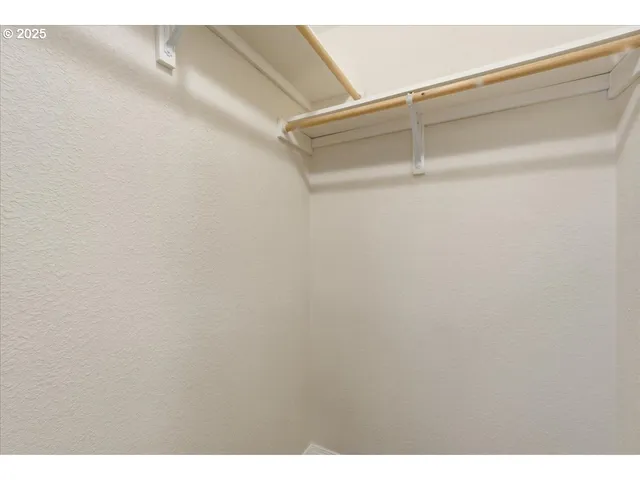 a view of small space with racks on the wall