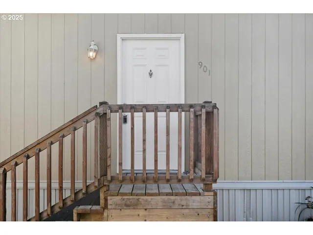 a view of a porch with wooden floor