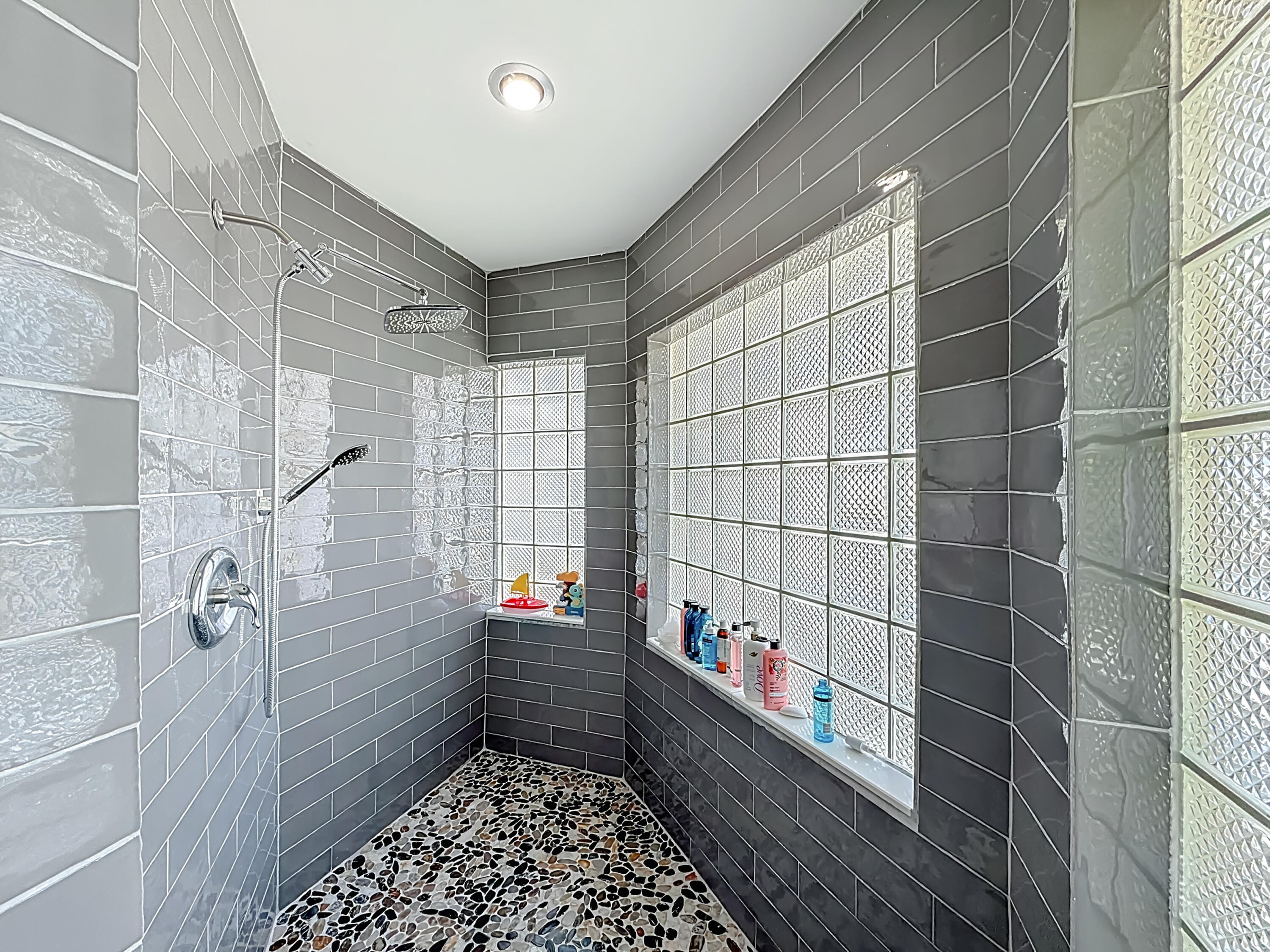 450 Northwest 53rd Street Boca Raton, FL 33487 - Photo 21 of 52 a bathroom with a shower