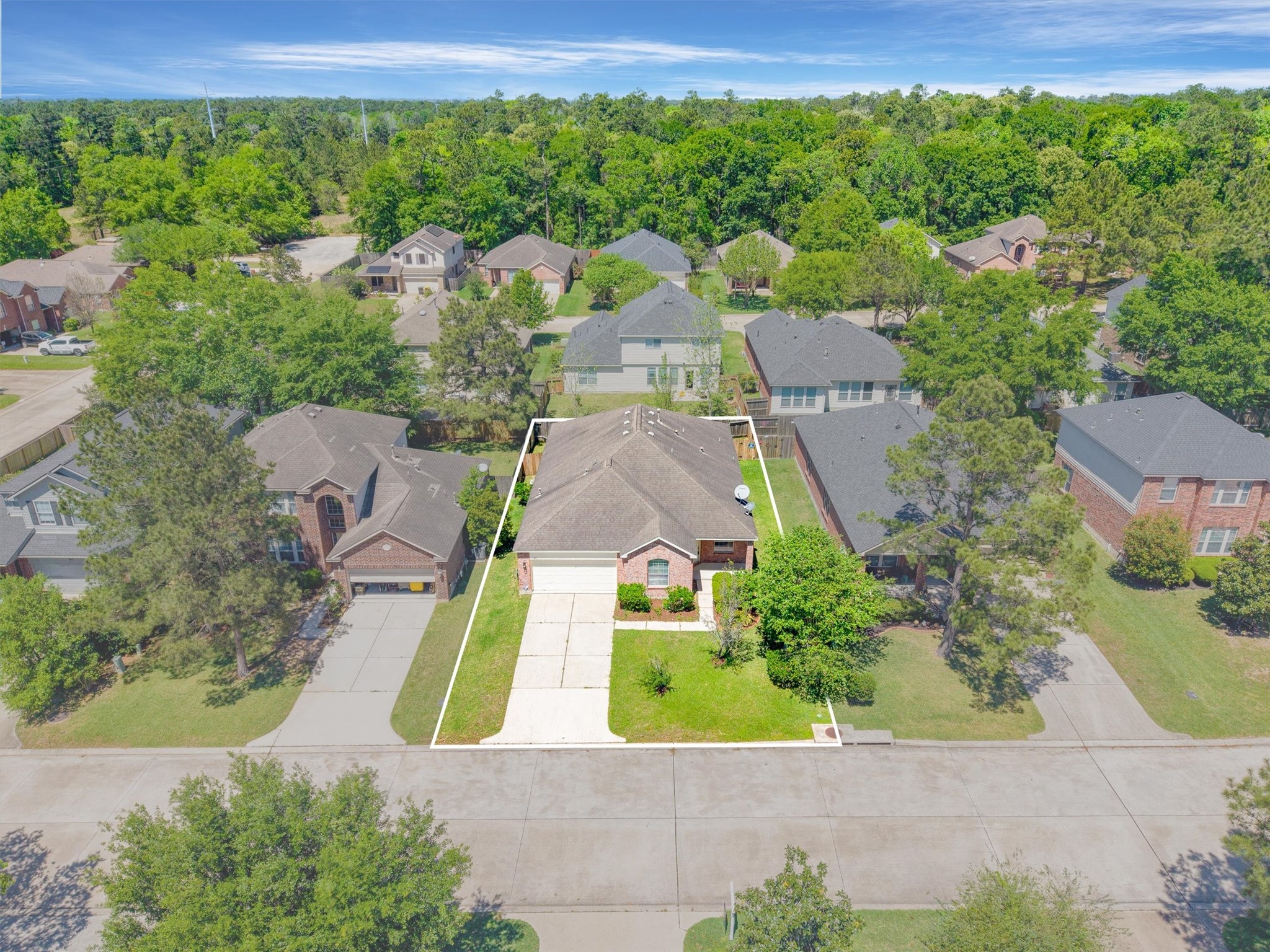 951 Crannog Way Conroe, TX 77301 - Photo 38 of 44 an aerial view of residential houses with outdoor space and street view