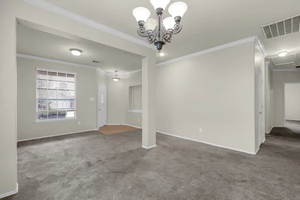 a view of a livingroom with a chandelier