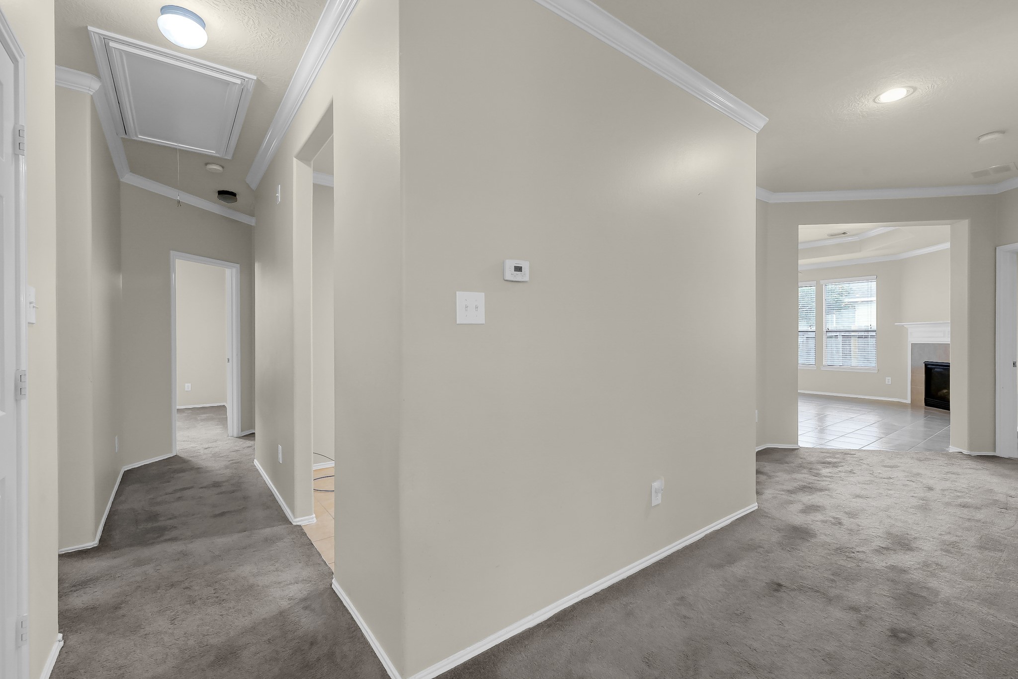 951 Crannog Way Conroe, TX 77301 - Photo 10 of 44 wooden floor in a hall with an entryway