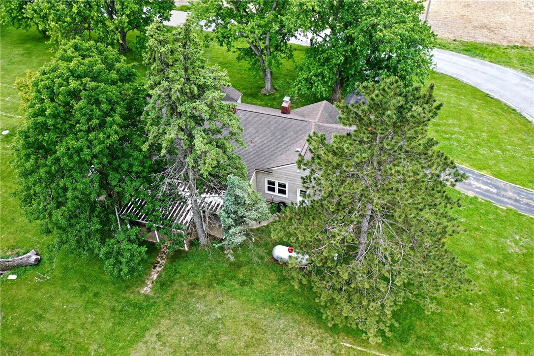 2470 Clark Run Road Xenia, OH 45385 - Photo 48 of 57 This charming residence is nestled amidst expansive green surroundings, offering a serene escape.