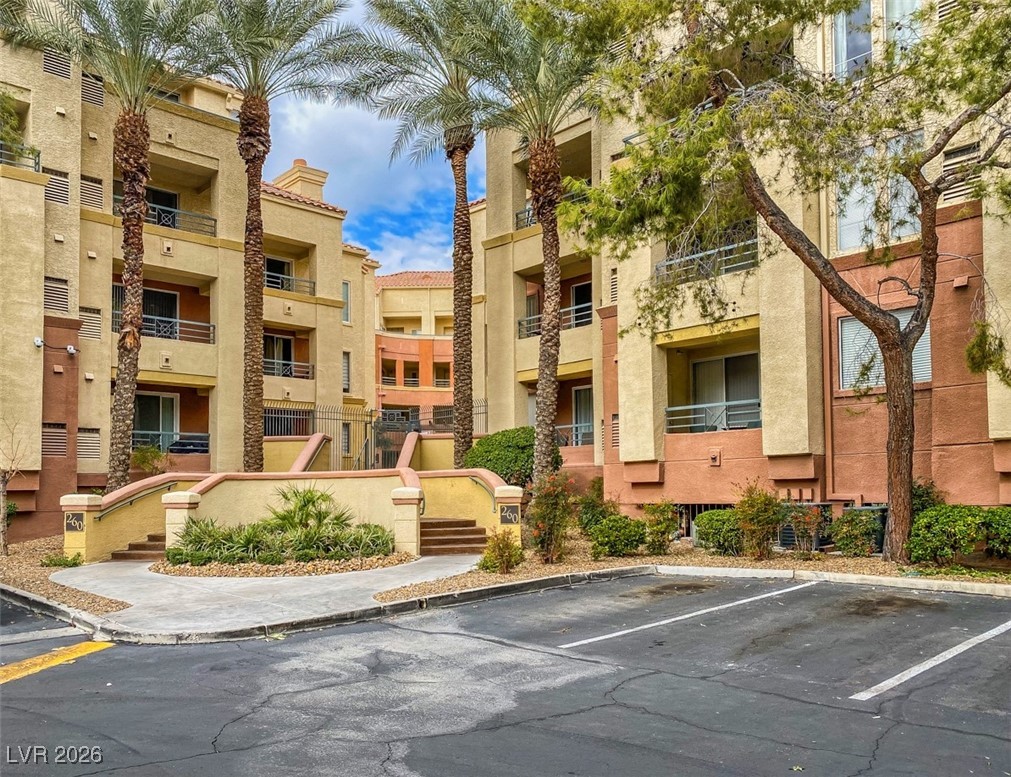 260 East Flamingo Road, Unit 229 Las Vegas, NV 89169 - Photo 5 of 31 View of apartment building / complex featuring uncovered parking
