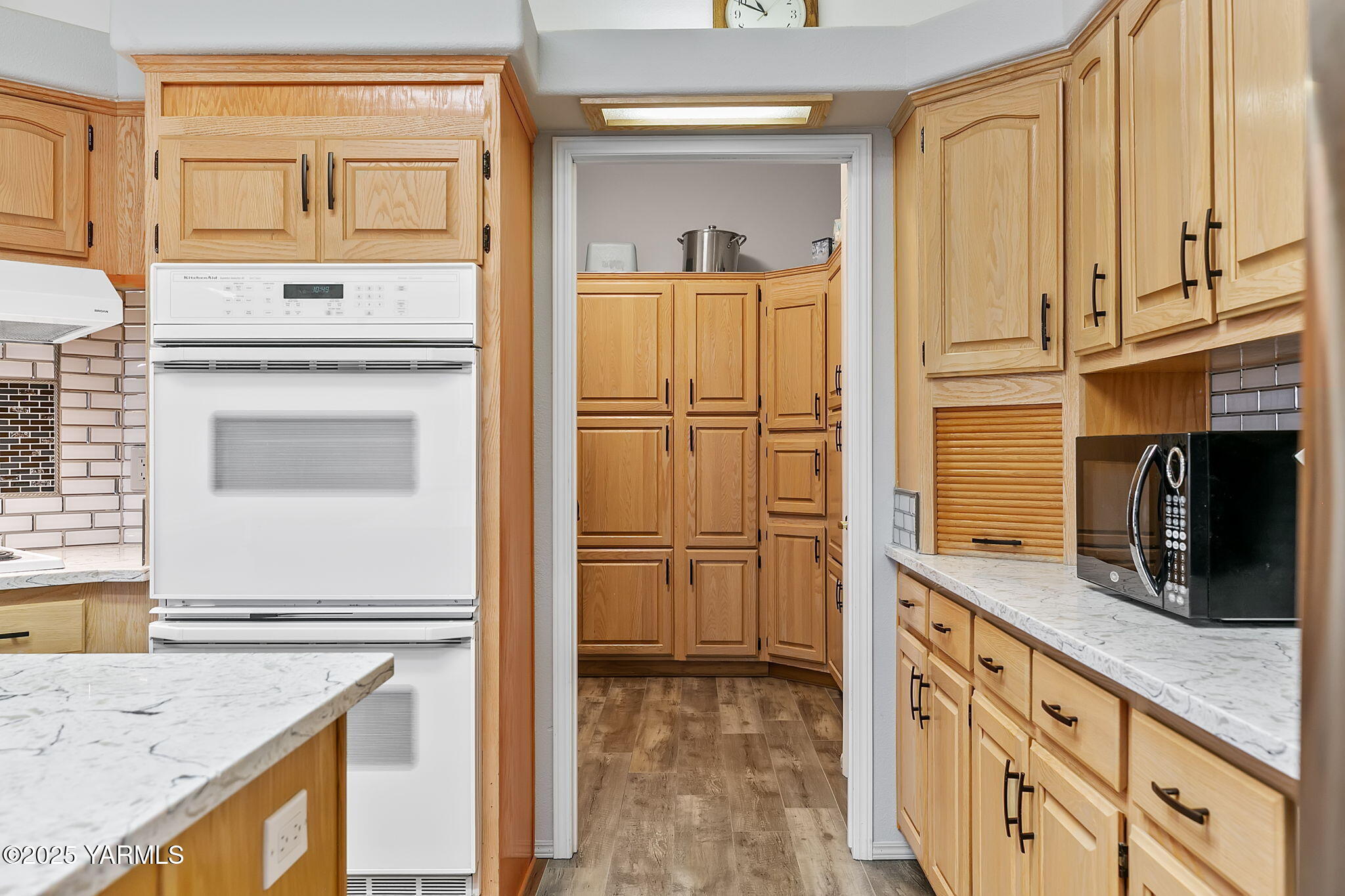 312 Wendt Road Yakima, WA 98901 - Photo 12 of 37 a kitchen with stainless steel appliances granite countertop a refrigerator and a stove top oven