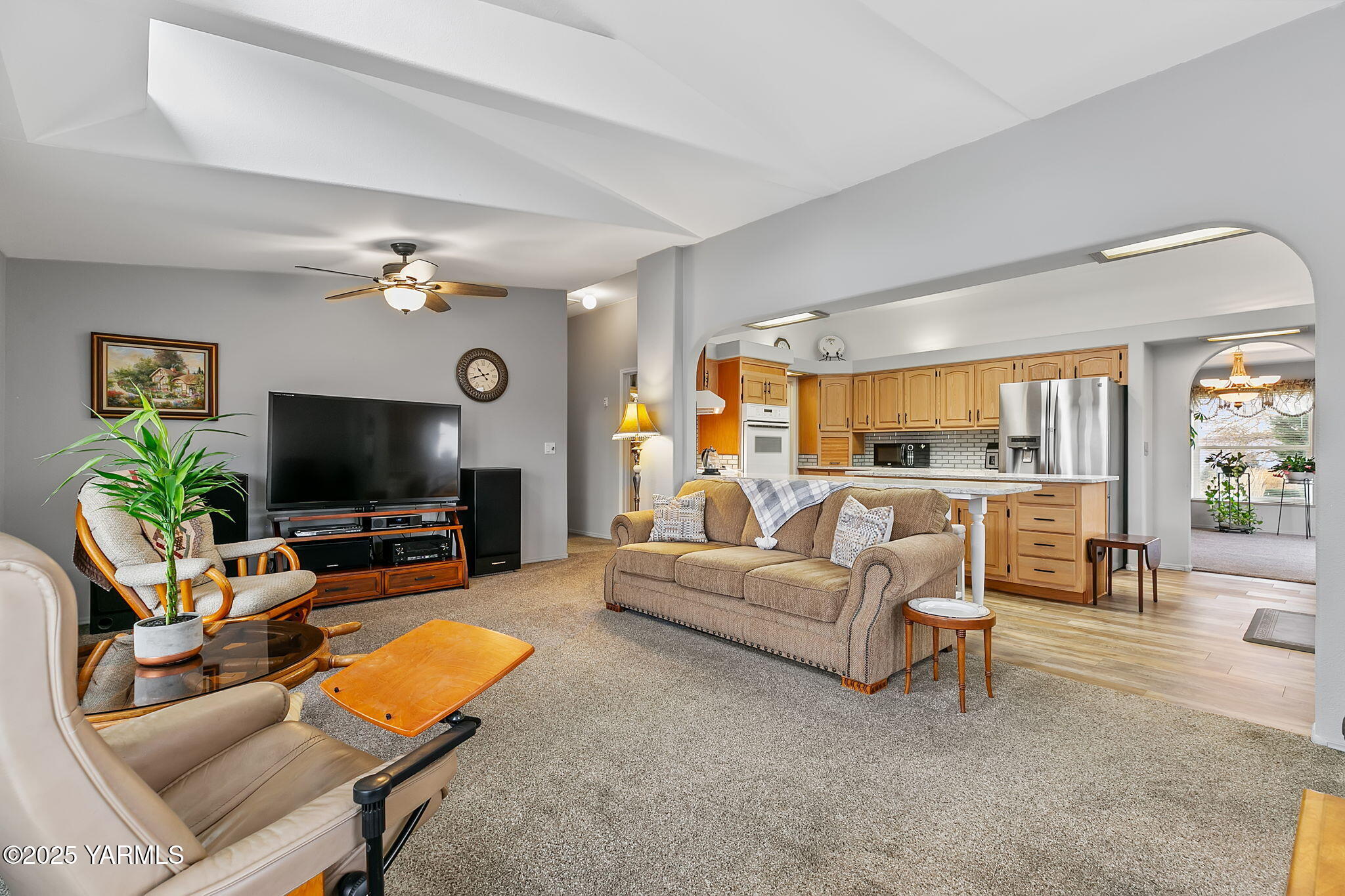312 Wendt Road Yakima, WA 98901 - Photo 6 of 37 a living room with furniture and a flat screen tv