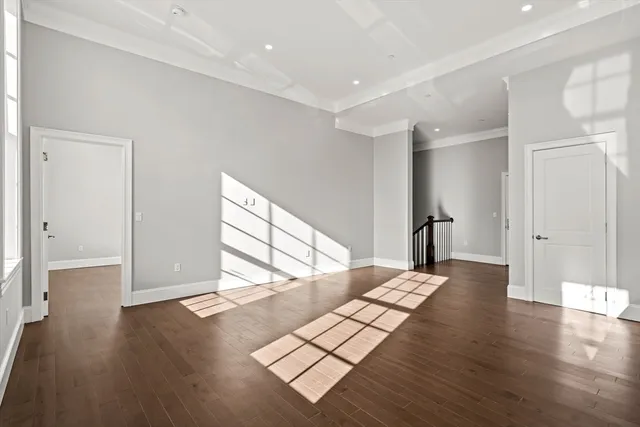 a view of entryway with wooden floor