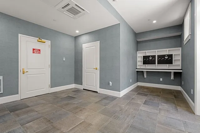 an empty room with windows