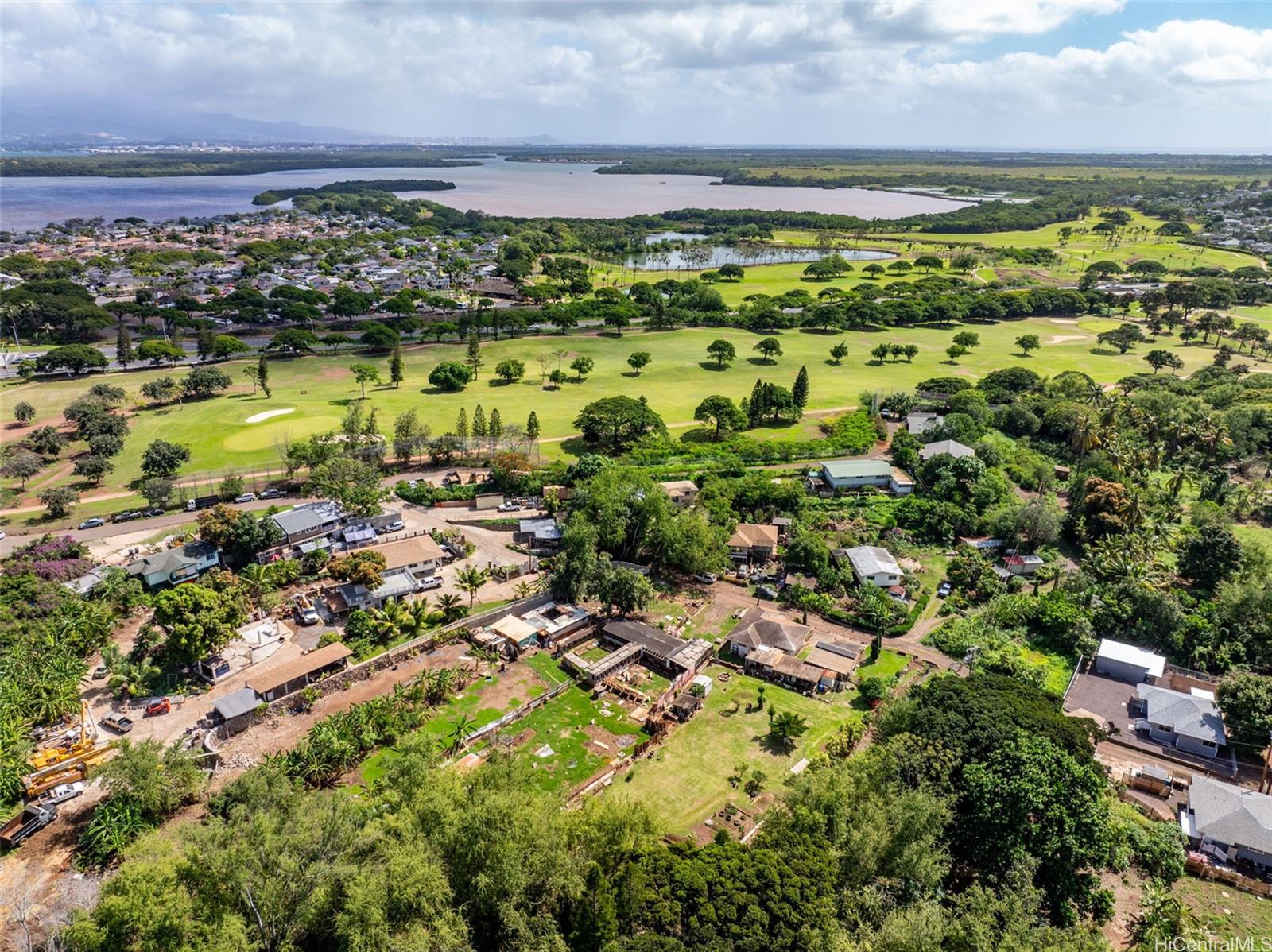 91-2133 Fort Weaver Road Ewa Beach, HI 96706 - Photo 11 of 23 a view of a city with lots of residential buildings and ocean view
