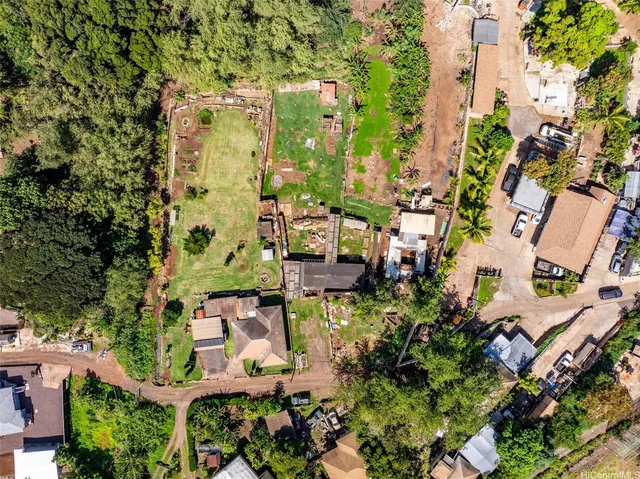 an aerial view of a city with lots of residential buildings