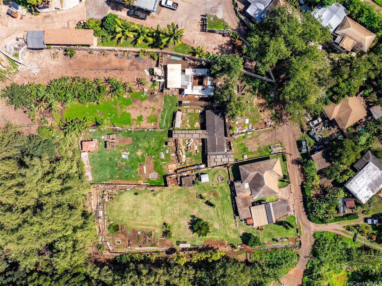 91-2133 Fort Weaver Road Ewa Beach, HI 96706 - Photo 20 of 23 an aerial view of a house with a yard