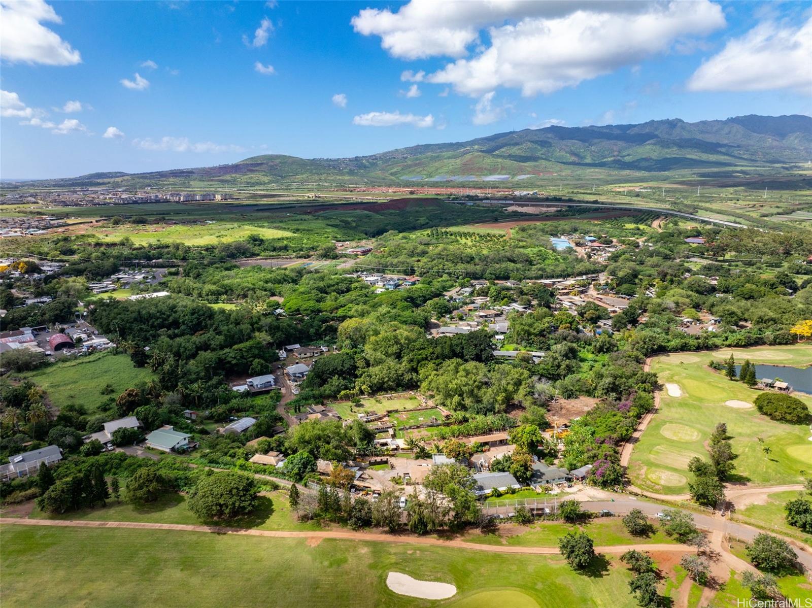 91-2133 Fort Weaver Road Ewa Beach, HI 96706 - Photo 2 of 23 a view of lake with mountain