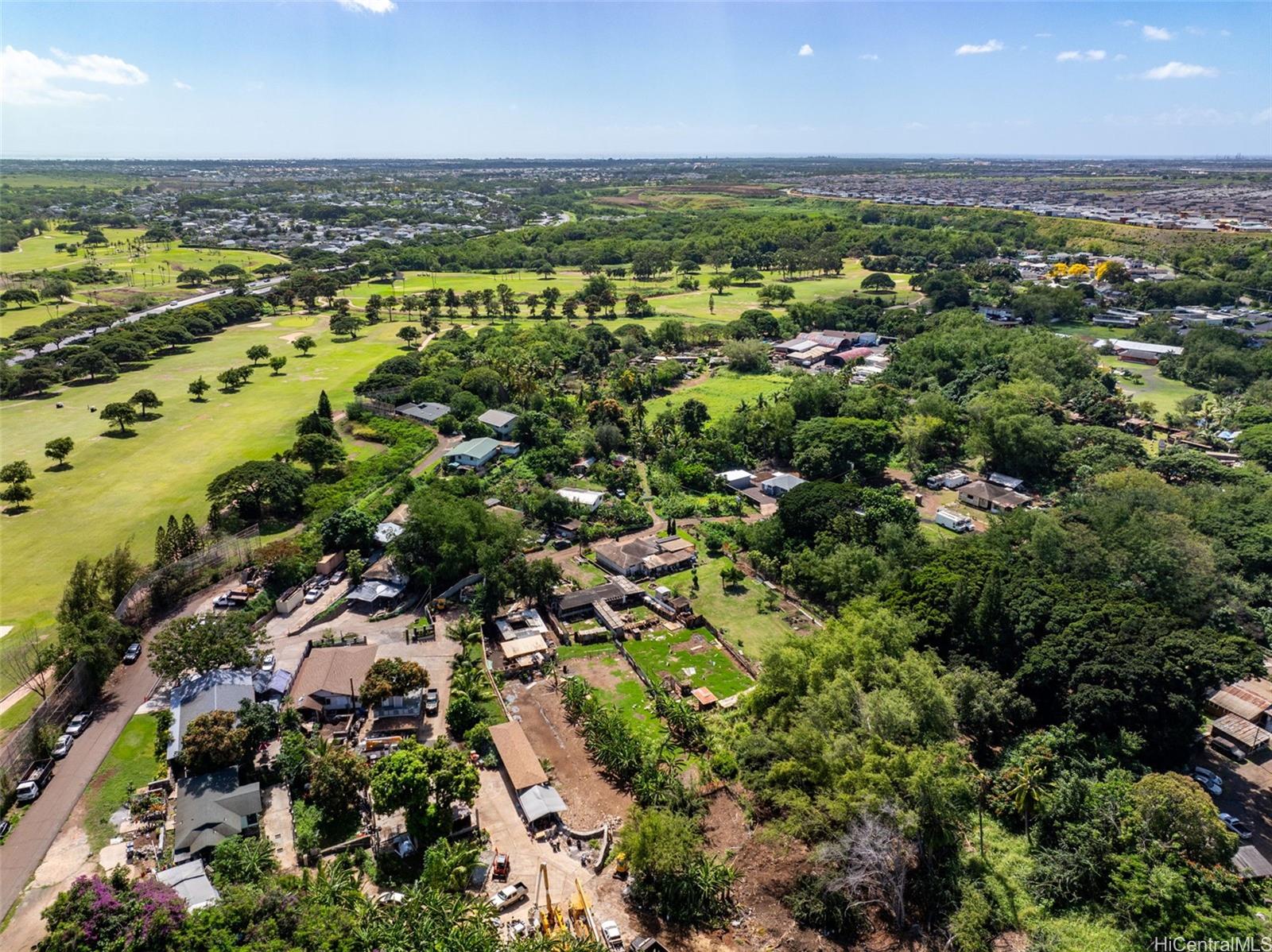 91-2133 Fort Weaver Road Ewa Beach, HI 96706 - Photo 21 of 23 an aerial view of a houses with a yard