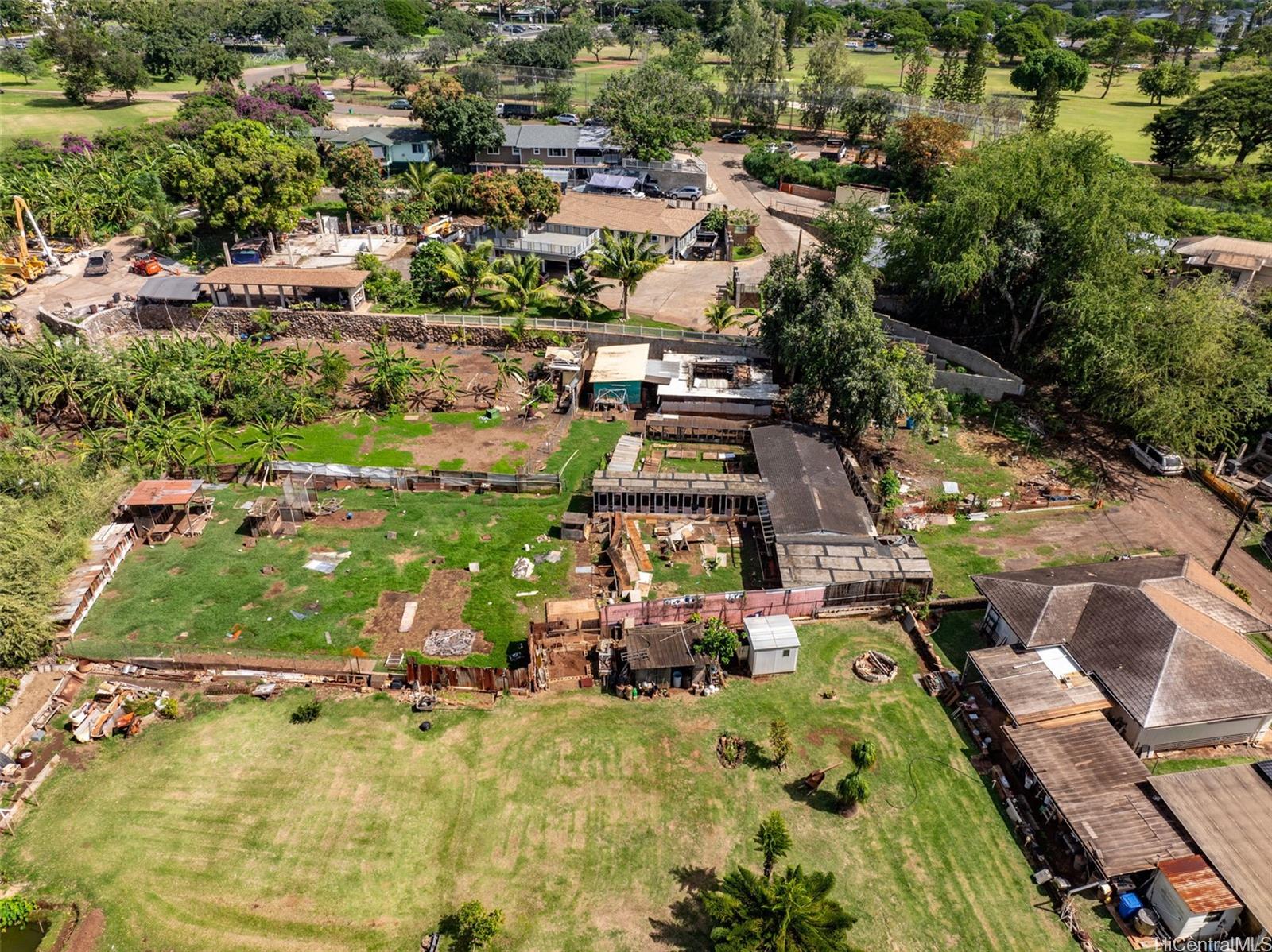 91-2133 Fort Weaver Road Ewa Beach, HI 96706 - Photo 3 of 23 an aerial view of residential houses with outdoor space
