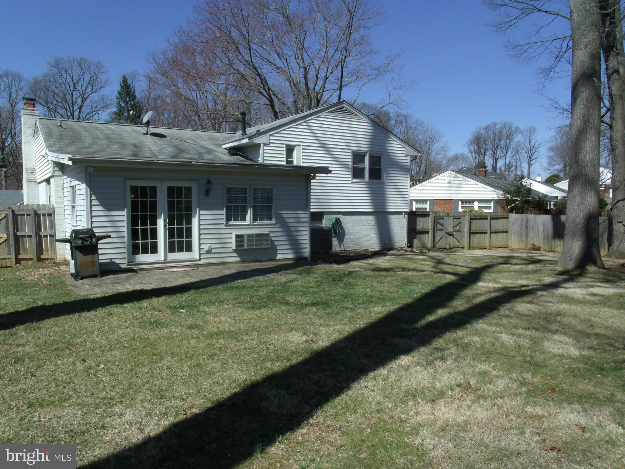 5214 Light Street Springfield, VA 22151 - Photo 25 of 27 a front view of a house with a yard