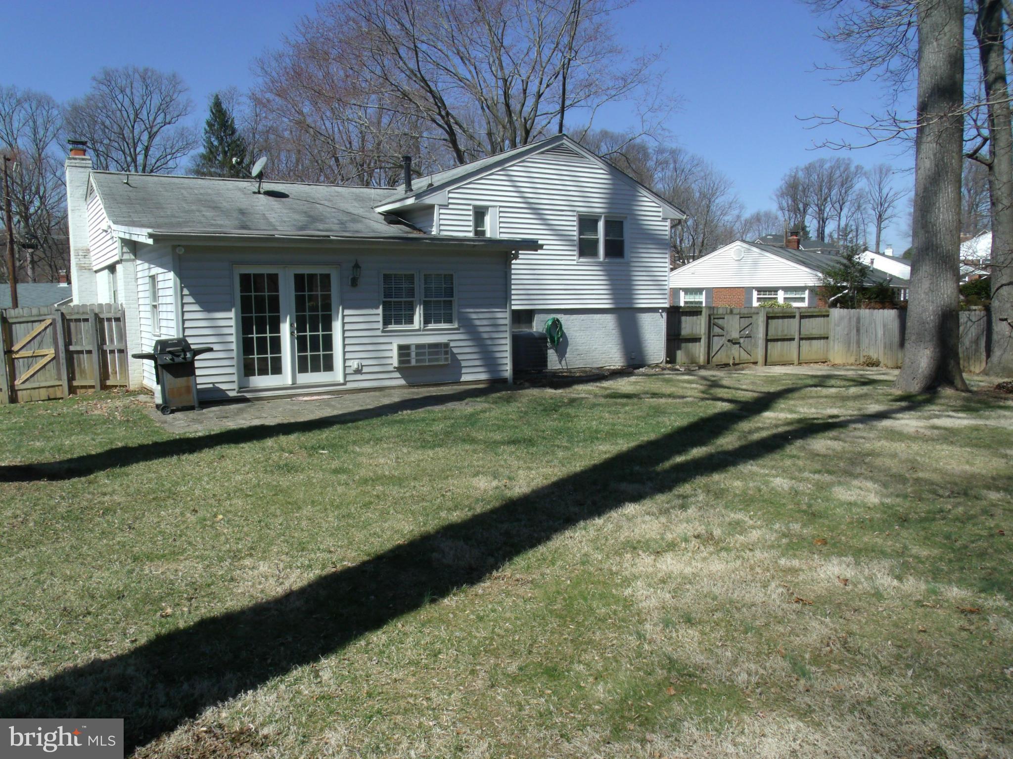 5214 Light Street Springfield, VA 22151 - Photo 26 of 27 a view of a house with backyard and porch
