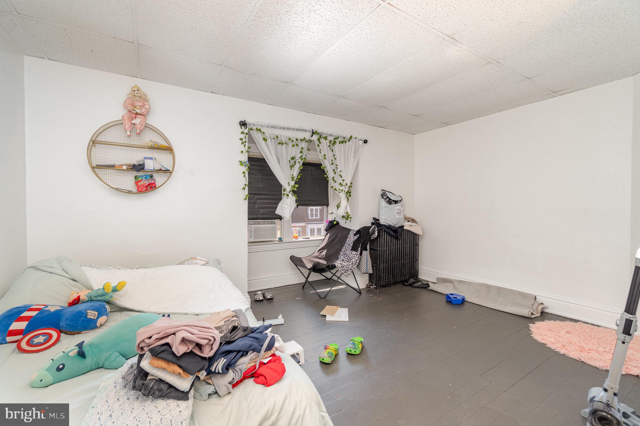 281 West Cottage Place York, PA 17401 - Photo 12 of 30 a bedroom with bed and a window