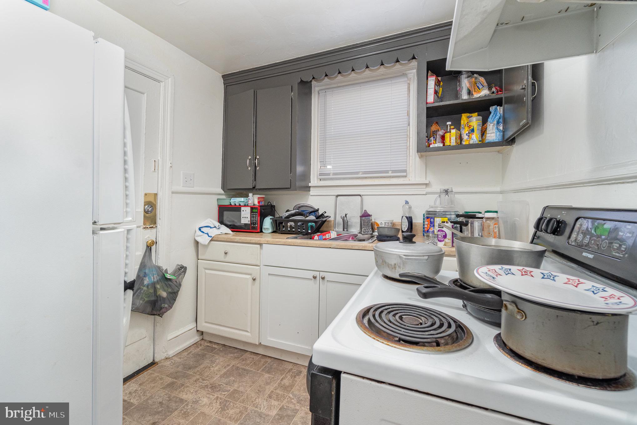 281 West Cottage Place York, PA 17401 - Photo 22 of 30 a kitchen with a stove and cabinets