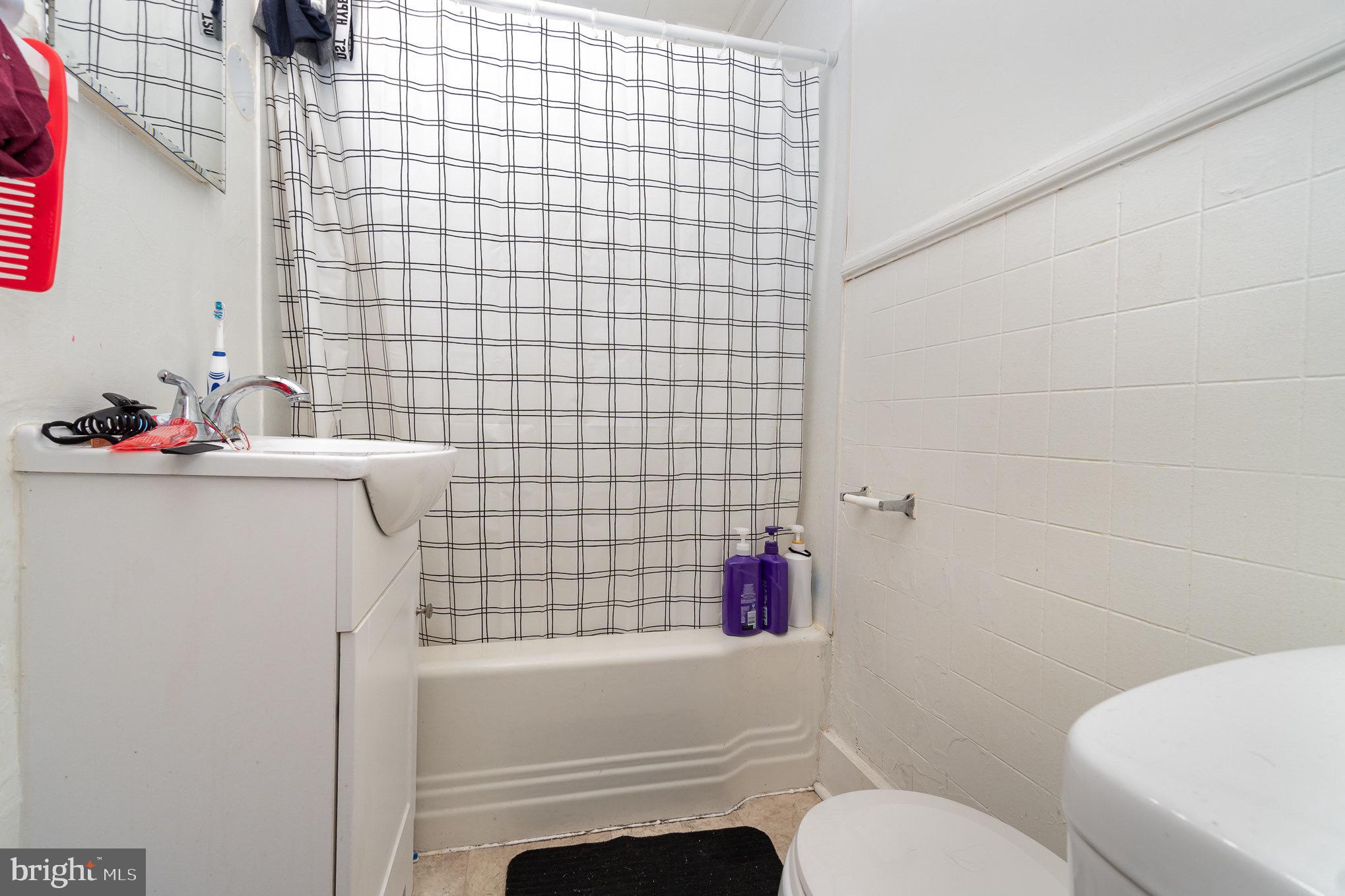 281 West Cottage Place York, PA 17401 - Photo 24 of 30 a bathroom with a sink toilet and shower