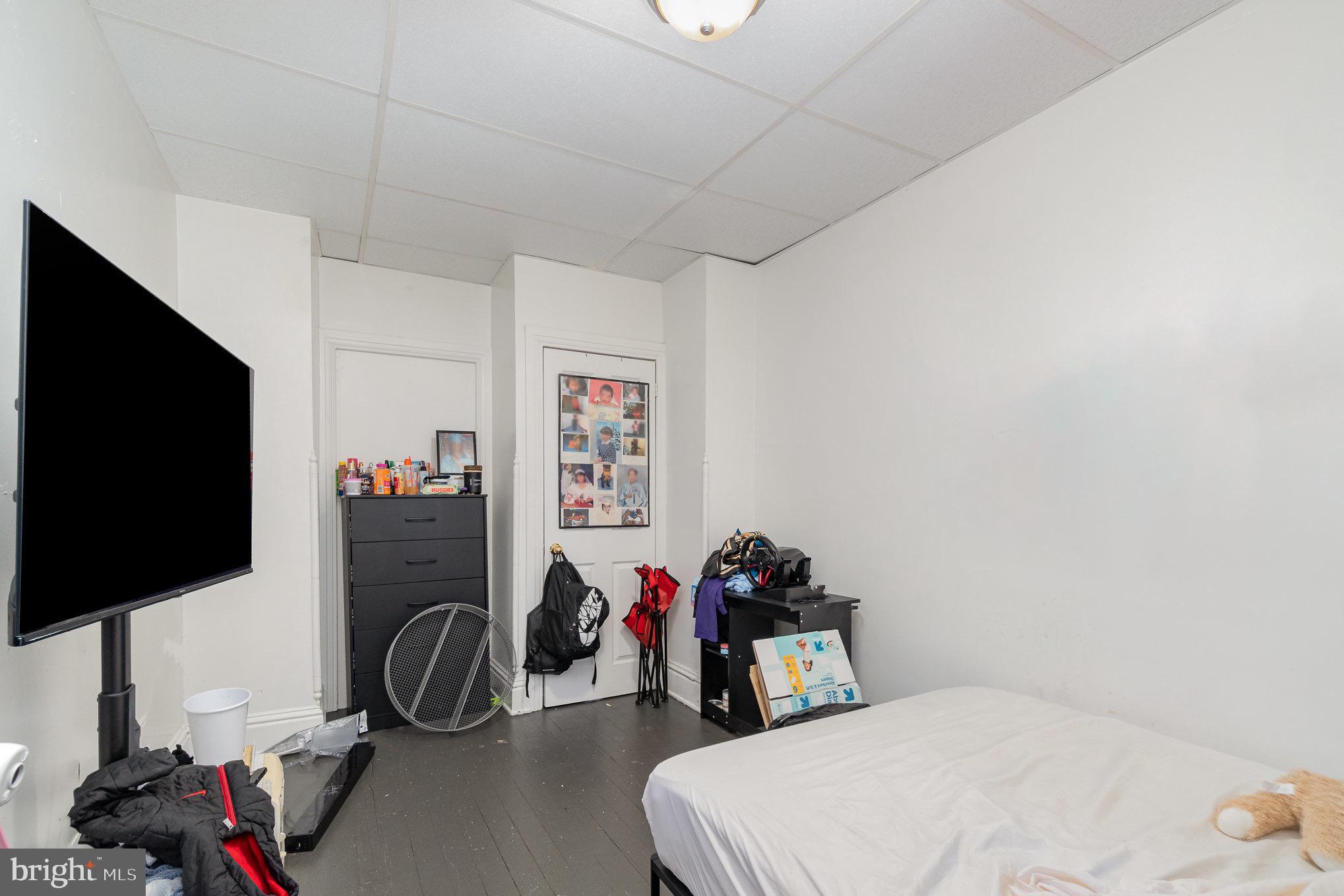 281 West Cottage Place York, PA 17401 - Photo 6 of 30 a bedroom with bed and a flat screen tv