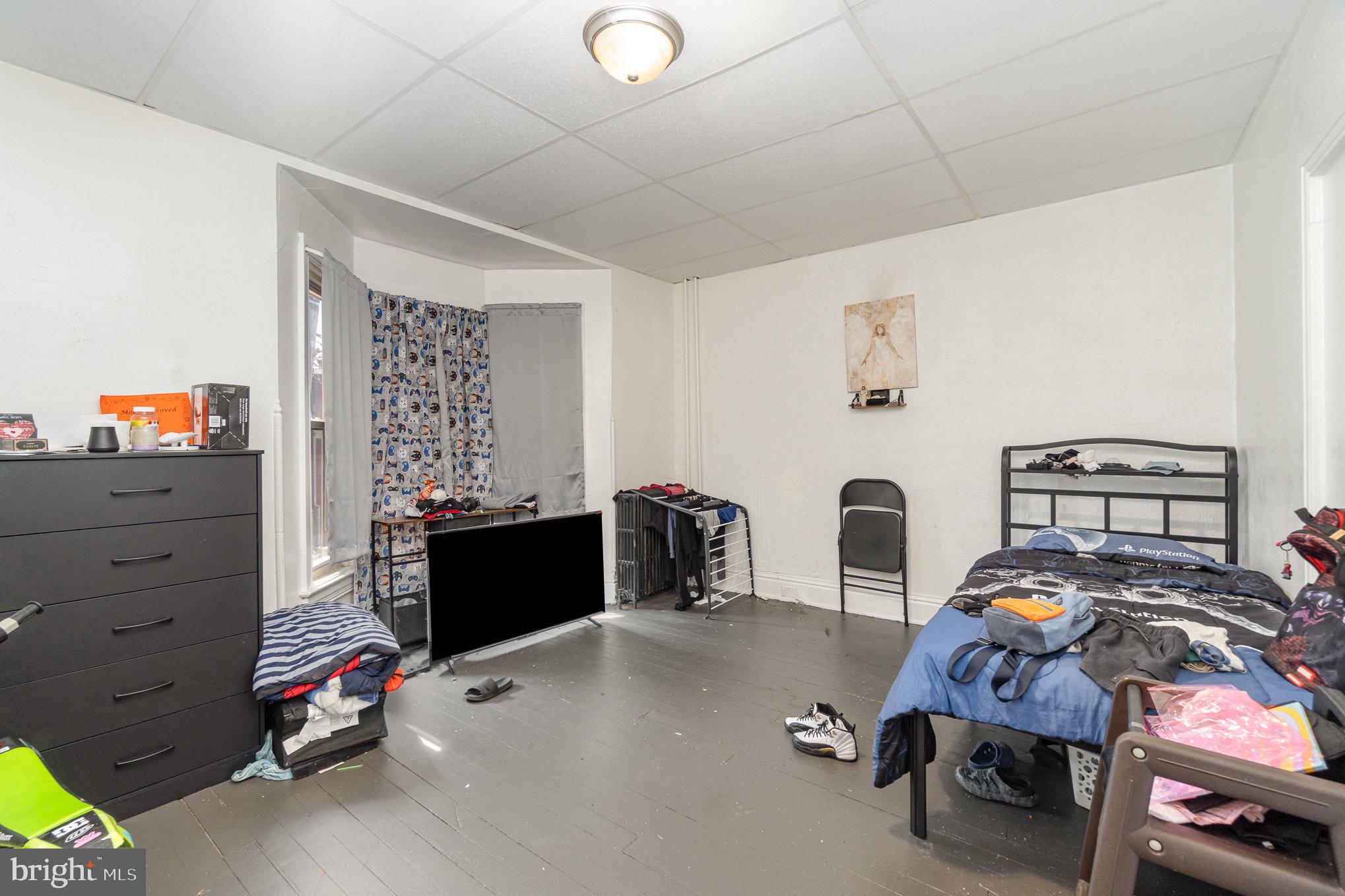 281 West Cottage Place York, PA 17401 - Photo 8 of 30 a bedroom with furniture and a window