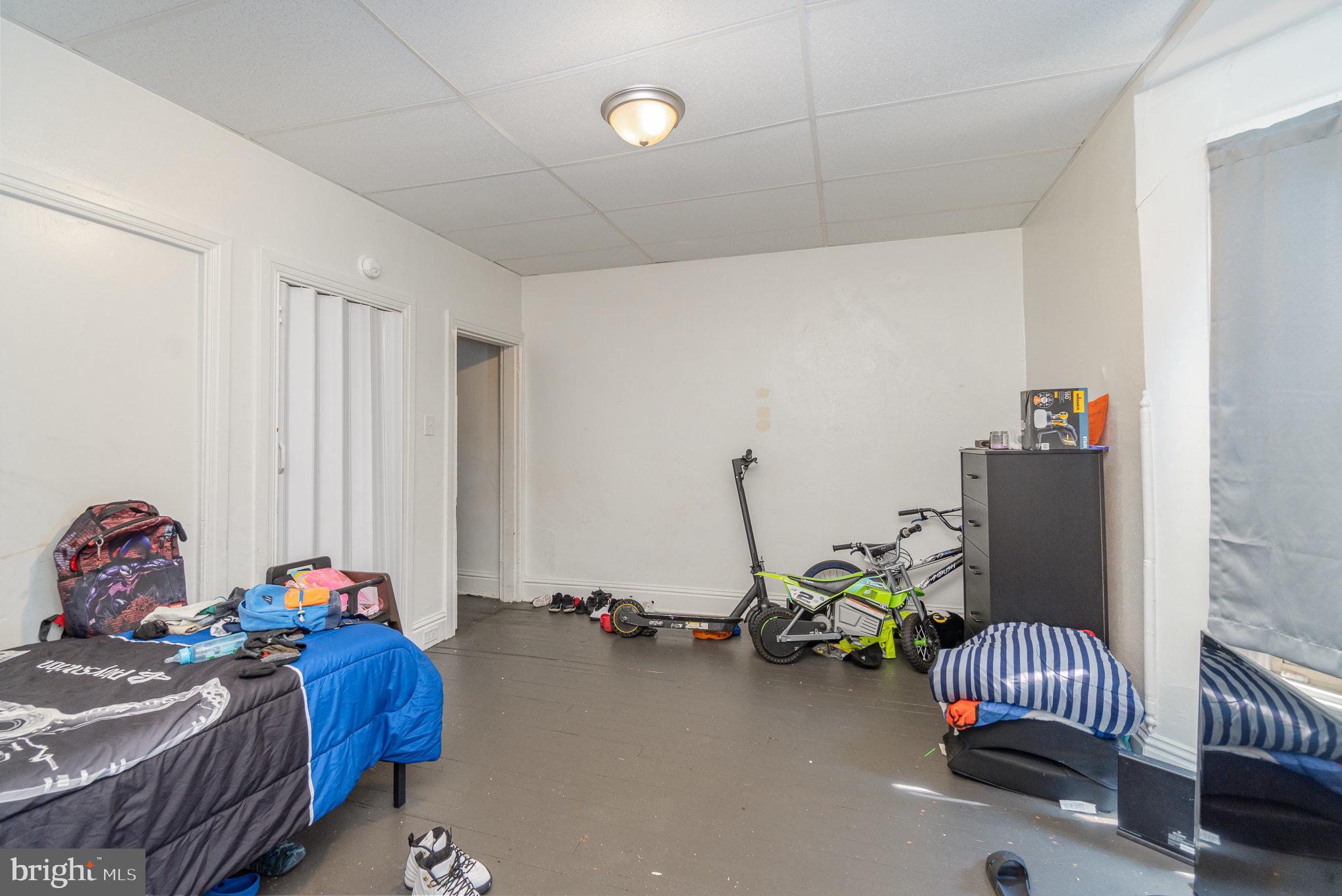 281 West Cottage Place York, PA 17401 - Photo 9 of 30 a bedroom with bed and a chandelier