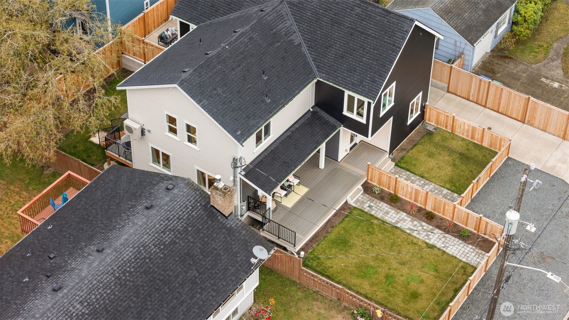 9253 6th Avenue Northwest, Unit B Seattle, WA 98117 - Photo 21 of 24 an aerial view of a house with a yard