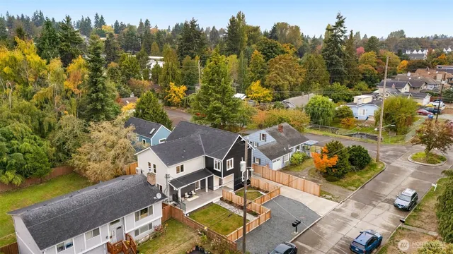 an aerial view of a house with a garden
