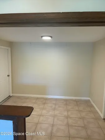 a view of a room with table and chair