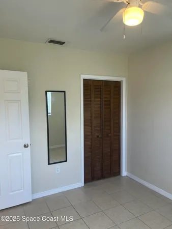 an empty room that has a window