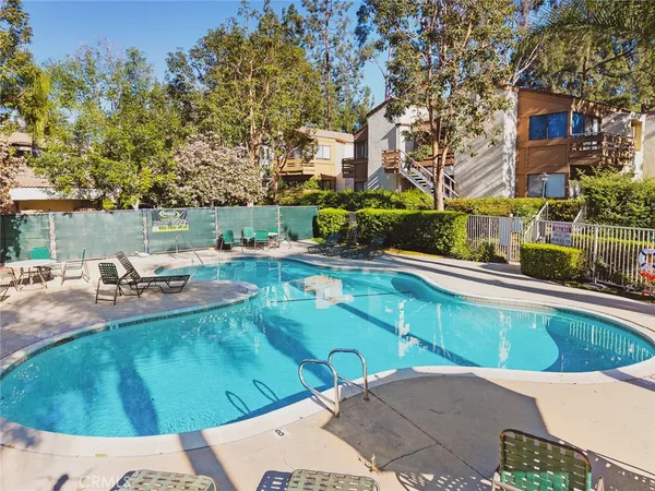 a view of a park with plants and trees