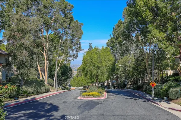 an aerial view of house with yard swimming pool and outdoor seating