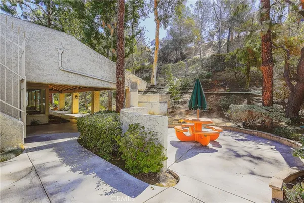 a view of yard with swimming pool