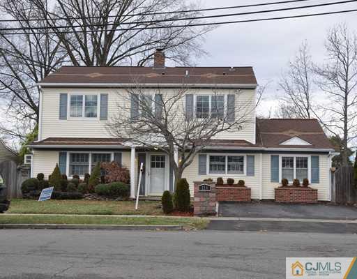 158 Winthrop Road Edison, NJ 08817 - Photo 1 of 1 a front view of a house with a garden